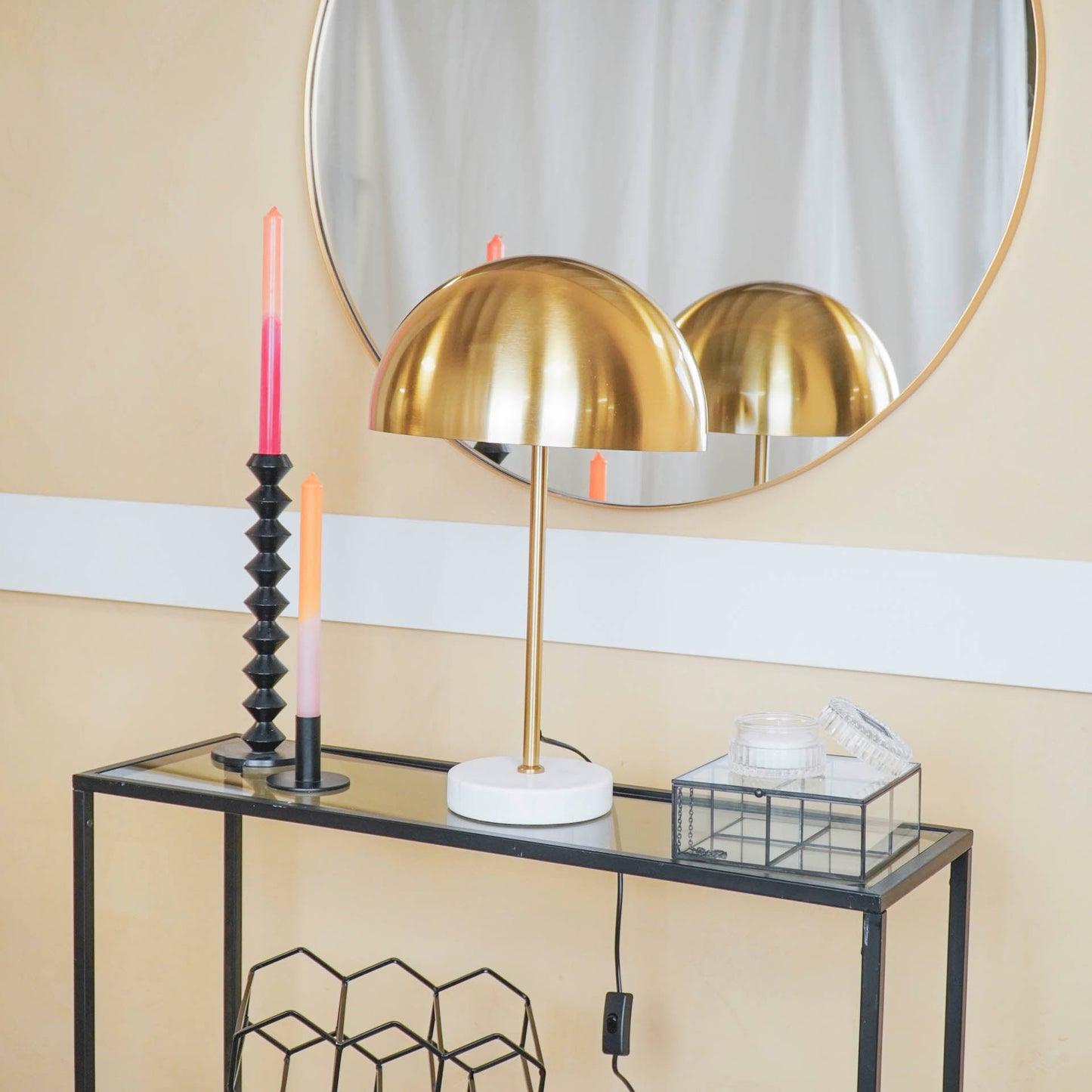 gold and marble mushroom lamp with mirror in background