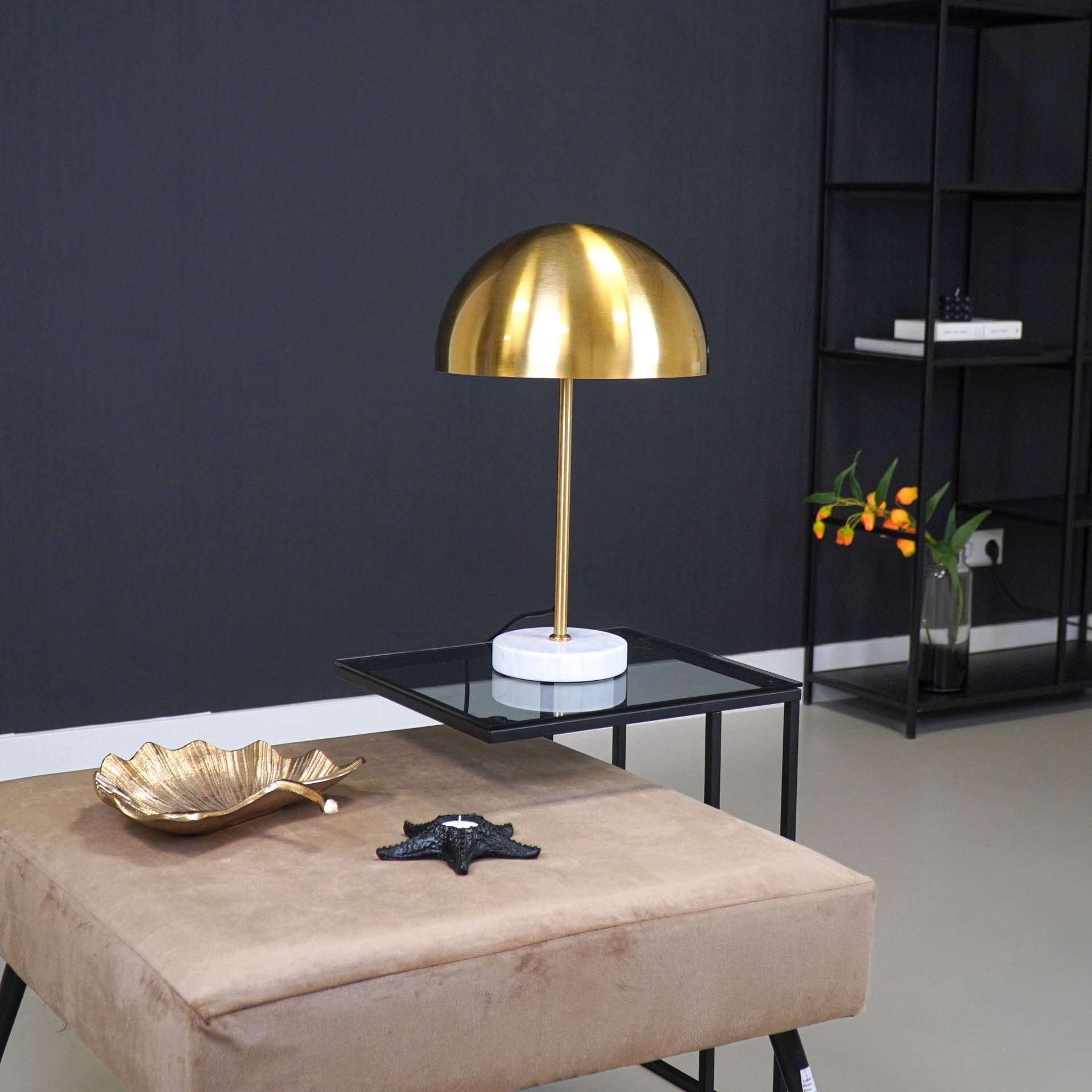 Gold and white mushroom lamp with black background